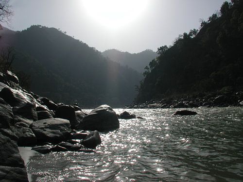 The wild river Ganges in the Himalayas at sunrise in India