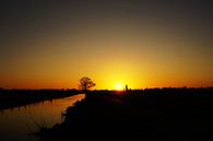 Zicht op Eemnes bij zonsondergang vanaf de Eempolder van Jos van den berg thumbnail
