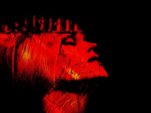 Het rode gezicht met de kroon