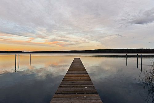 The sky is reflected in the wintry lake water by Silva Wischeropp