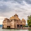 A steamboat approaches the castle of Chillon, near the town of Montreux (Switzerland). by Carlos Charlez