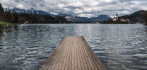 Bled, Slovenia, 04 11 2018: View over Bled lake, a wooden jetty 