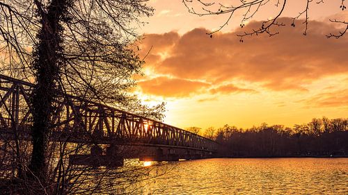 Sunset at old railway bridge over the Ruhr at the Baldeneysee Essen Ruhr area