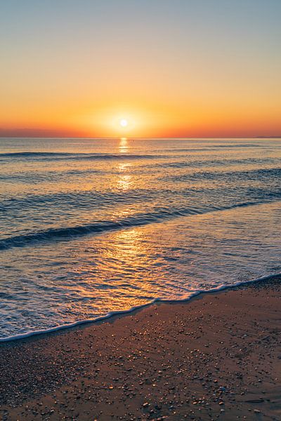 Sunrise on the sandy beach by Christian Klös