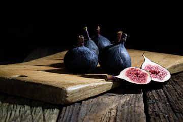 Figs on a shelf - in front of the wall in the kitchen by Marja Suur