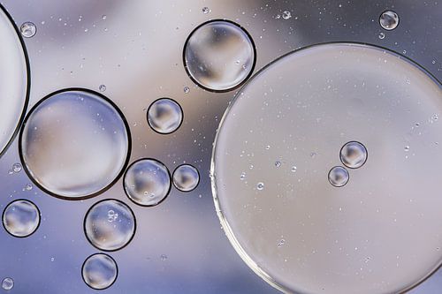 Oliedruppels op water (pastel kleuren)