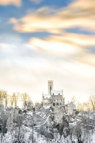 Lichtenstein Castle in winter with snow in the evening at sunset