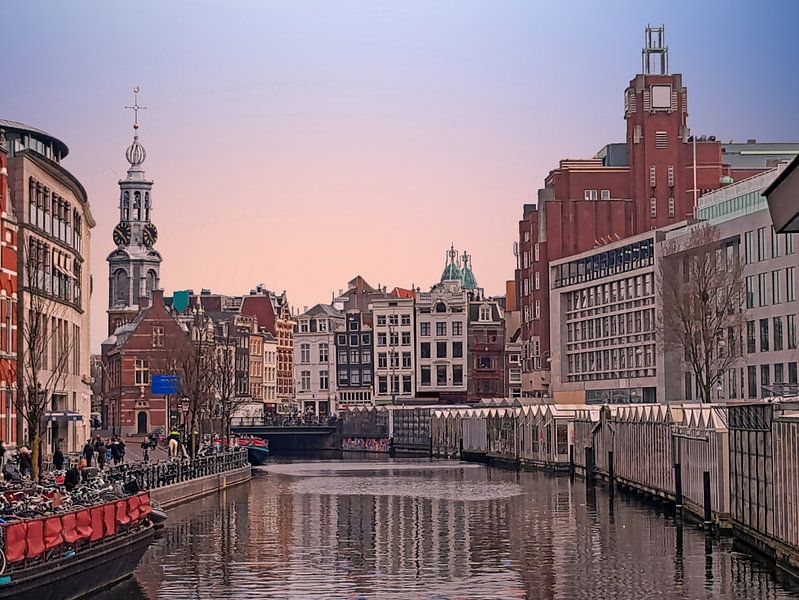 The Munttoren in Amsterdam at sunset in the Netherlands by Eye on You