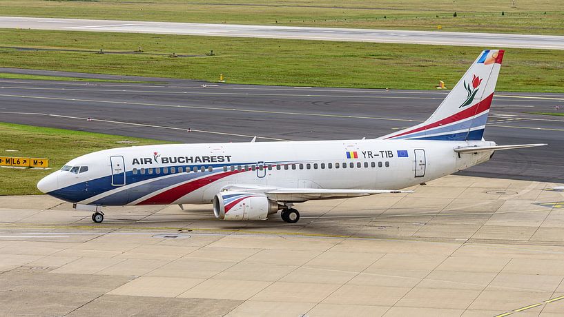 Air Bucharest Boeing 737-300 passenger jet. by Jaap van den Berg