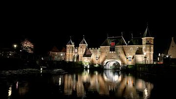 Koppelpoort at night by Jan van der Knaap