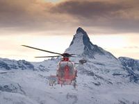 Rescue Helicopter of Air Zermatt in front of the Matterhorn