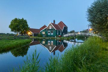Zaanse Schans, house and bridge reflected in the water by Ad Jekel