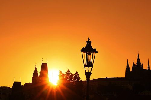 Sunset silhouettes of Charles Bridge in Prague