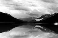Black and white photo of mountains and a car at Moose Lake, Canada
