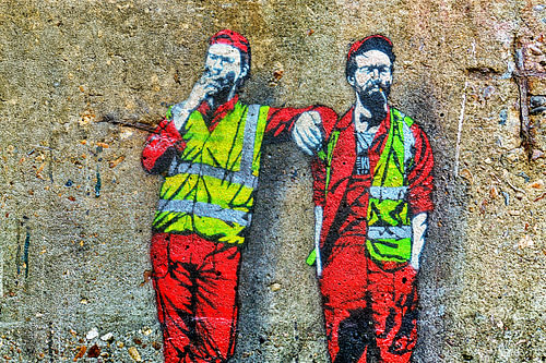 Graffiti op een muur in Shoreditch, Londen.