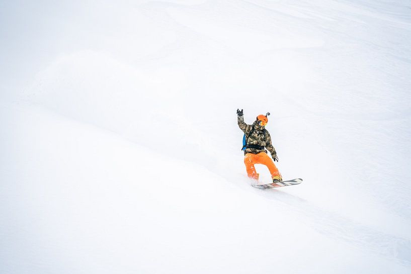 Freeriding powder snow riding in Montafon, Vorarlberg Snowboard group by Leo Schindzielorz