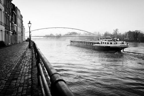The Rustica, a boat from Maasbracht, travels through Maastricht by Streets of Maastricht