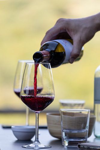 Pouring red wine