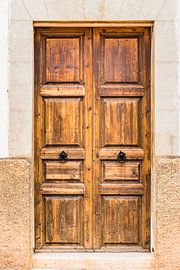 Detail view of old wooden front door residence entrance by Alex Winter