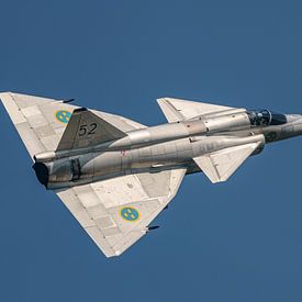 Saab AJS-37 Viggen flying in the sky, blue soft background by Jolanda Aalbers