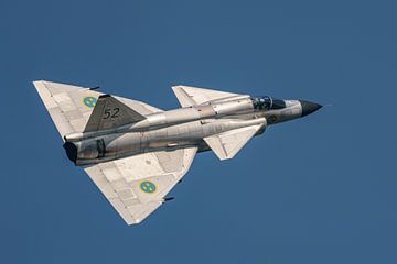 Saab AJS-37 Viggen flying in the sky, blue soft background
