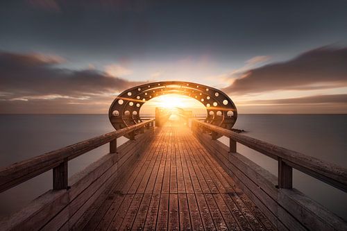 Zonsopgang op de pier van Kellenhusen aan de Oostzee