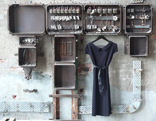 LBD/ black dress to old meter case in old urban factory.
