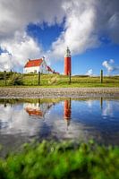 Leuchtturm von Texel mit Spiegelung.