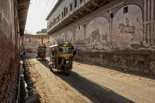 Delhi, India. Tuktuk. traditional Indian motorcycle rickshaw taxi on one of the streets of New Dehli