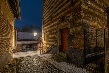 Elsloo in the evening in winter with snow by Maurice Meerten