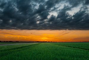 Sunset over the fields of Nieuw Vennep by M DH