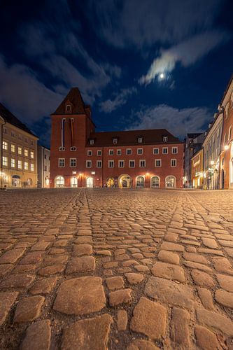 Haidplatz in Regensburg, Bavaria at night with moon by Robert Ruidl