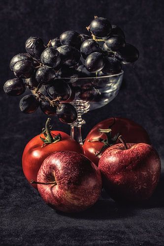 Stilleven met druiven in een glas