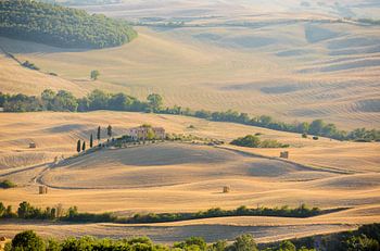 Tuscan farm on a hill