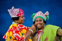 Suriname, Paramaribo. Creole women in Kotomisi clothing.