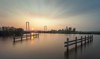 Fahrradbrücke der Rötelmaus bei Sonnenuntergang von Martijn van Dellen Miniaturansicht