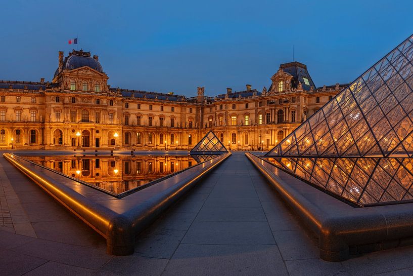 Louvre Museum reflected in the water by Markus Lange
