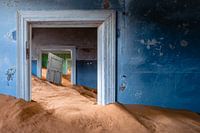 House with loose door in metre-high sand - Kolmanskop, Namibia