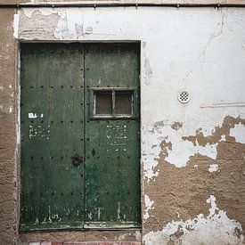 Gable with old green door by Sandra Hogenes