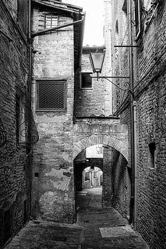 Gaase with arches in Volterra Tuscany by Frank Andree