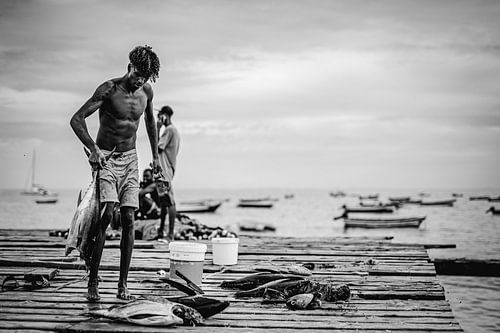 Fisherman on the old pier of Santa Maria in Sal, Cape Verde (Africa) by Benjamien t'Kindt