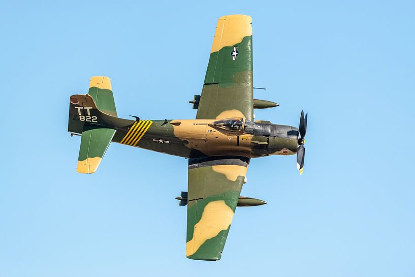The Vietnam War Flight Museum's Douglas A-1D Skyraider in action during the 2014 Wings over Houston  by Jaap van den Berg