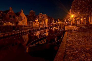 Het historisch stadje Sloten in Friesland Nederland bij avond van Eye on You