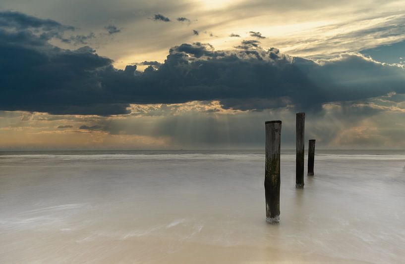 3 piles at Petten by peterheinspictures