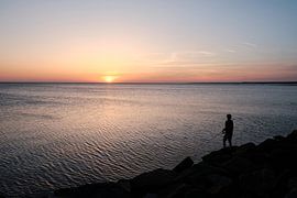 Pêche au coucher du soleil