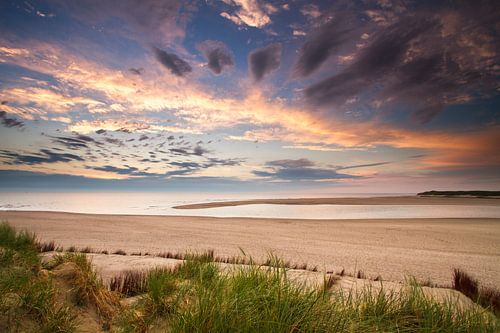 The sunset at the Dutch coast as seen from the dunes