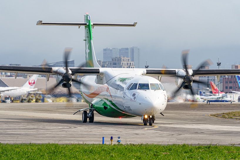 Taxiing UNI Air ATR-72. by Jaap van den Berg