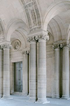 Pillars and arches at the Louvre in Paris by Alexandra Vonk