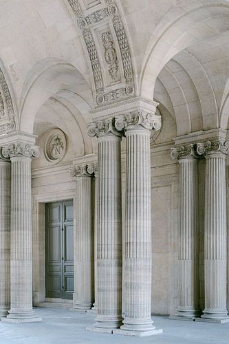 Pillars and arches at the Louvre in Paris