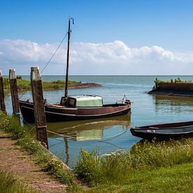 Old fishing harbour Laaksum by Martin de Bock